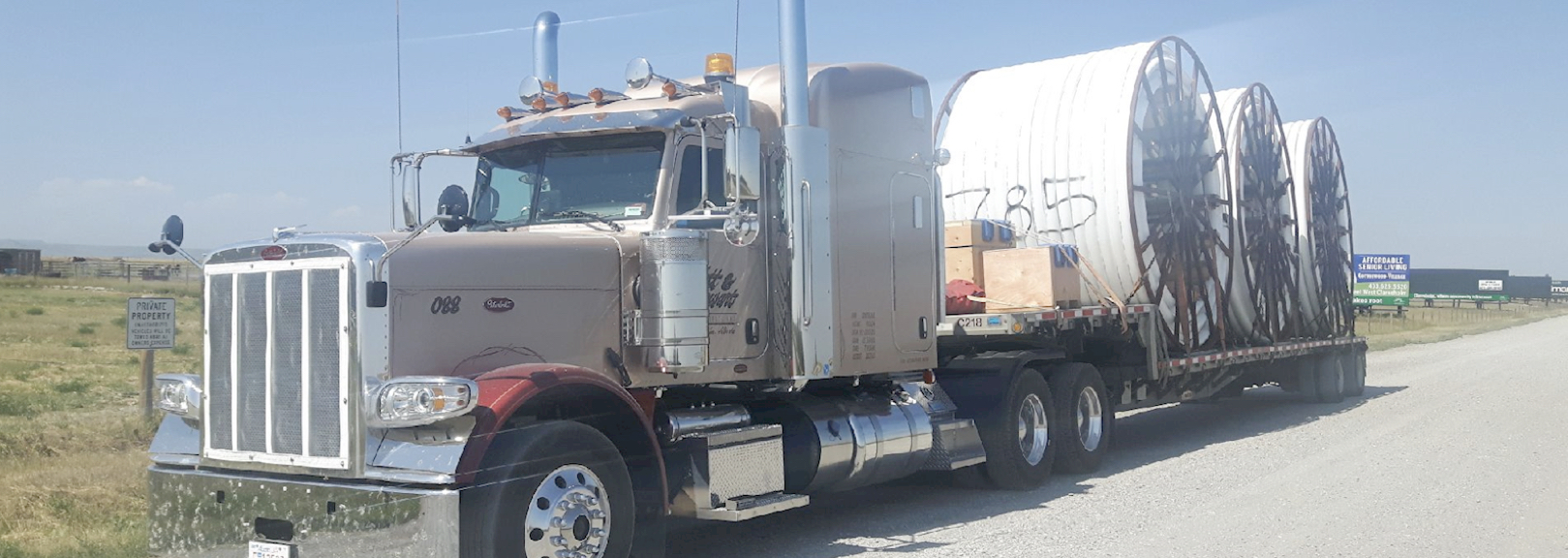 Tractor Hauling Heavy Equipment